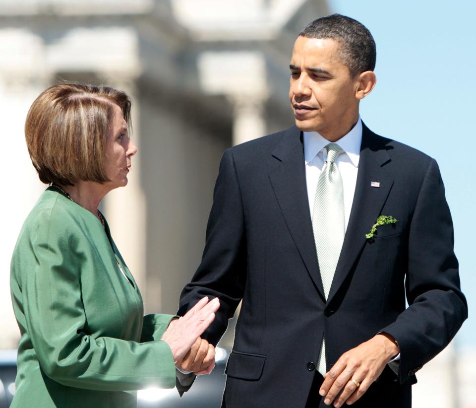 President Obama talks with Pelosi on Capitol Hill on March 17, 2010, after they attended a Friends of Ireland luncheon for St. Patrick's Day.
