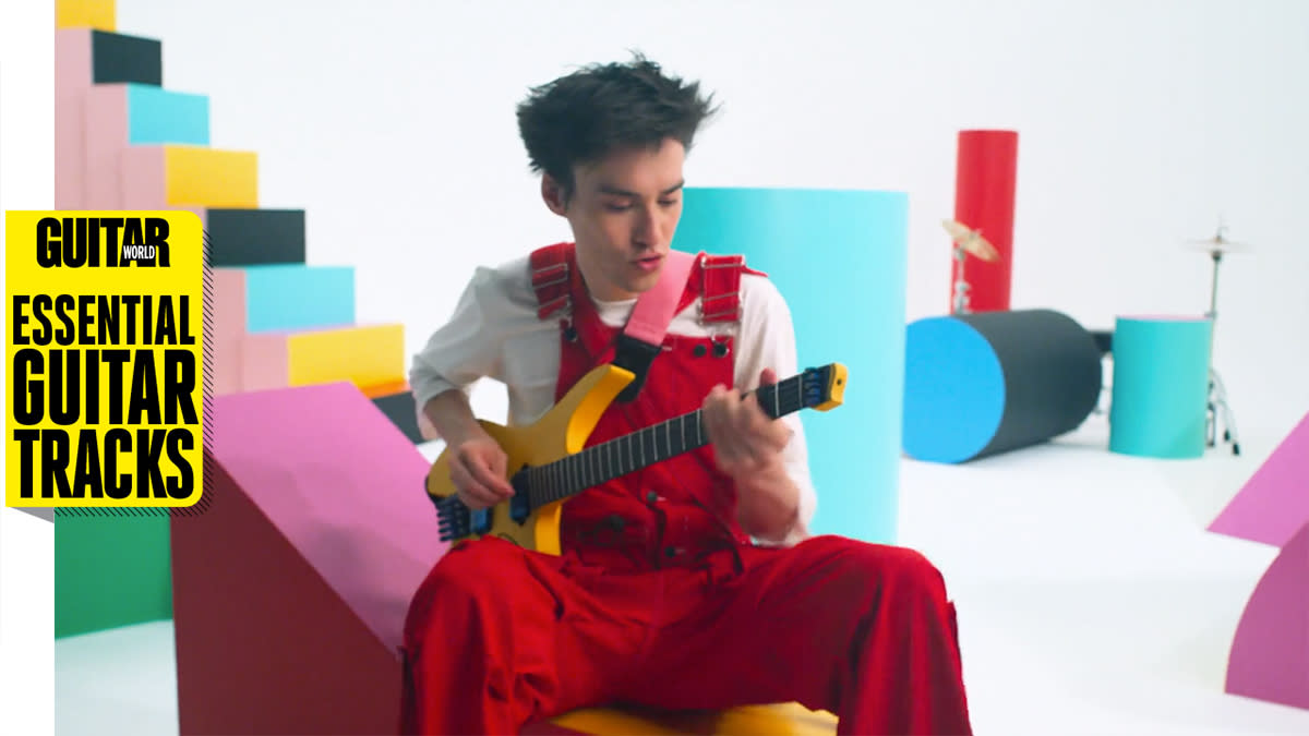  Jacob Collier playing a yellow five-string Strandberg 