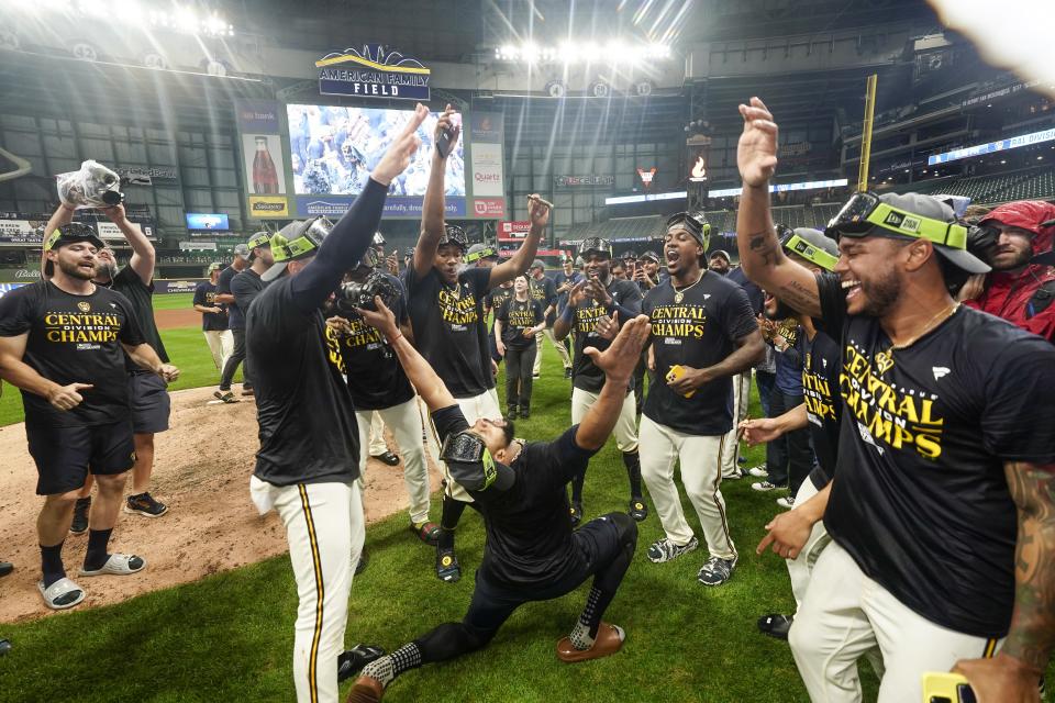 Milwaukee Brewers' players celebrate after clinching the National League Central Division after a baseball game against the St. Louis Cardinals Tuesday, Sept. 26, 2023, in Milwaukee. (AP Photo/Morry Gash)