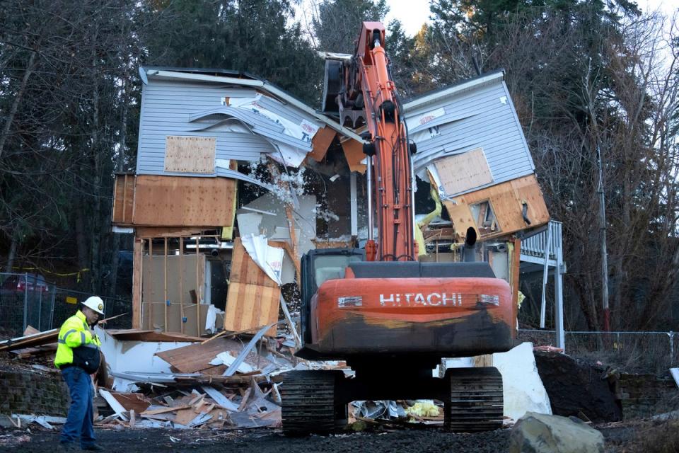 The house where the murders took place was razed to the ground – a decision that divided the families of the victims (AP)