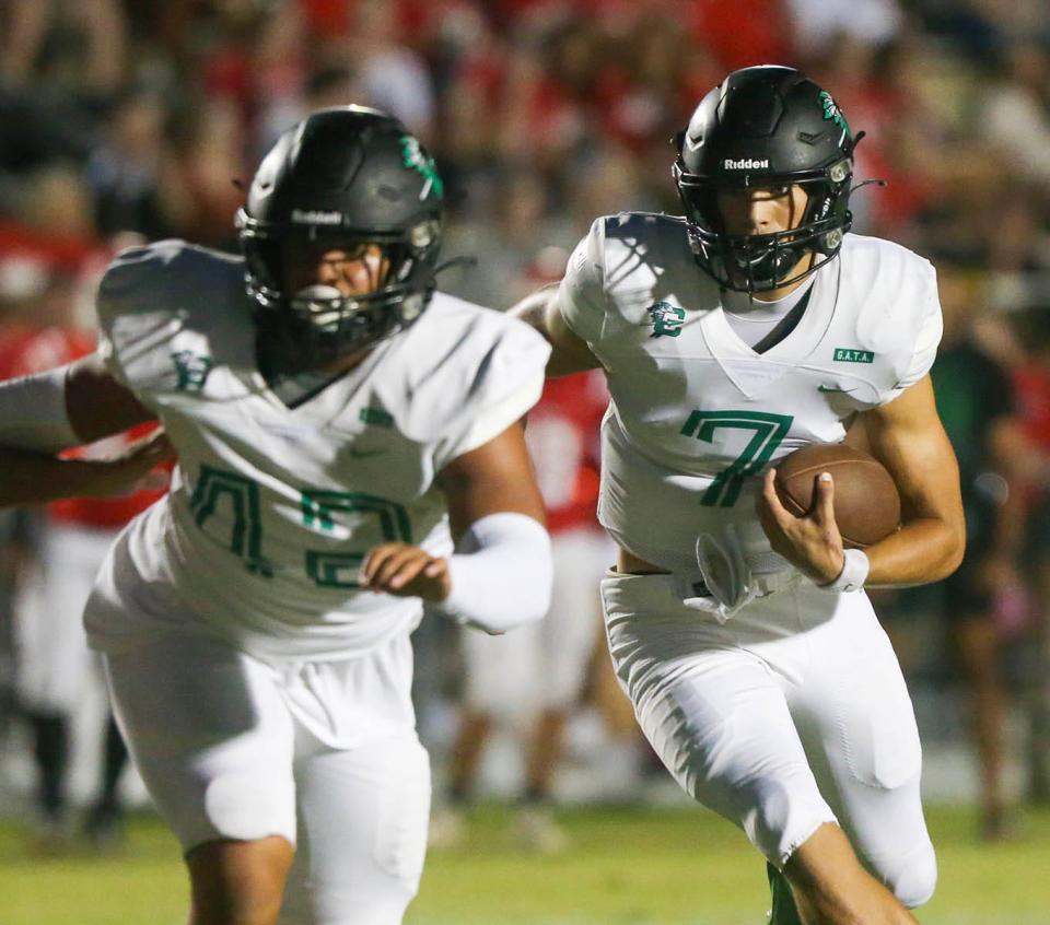 Choctaw QB Jesse Winslette carries the ball during the Crestview-Choctaw football game at Crestview.