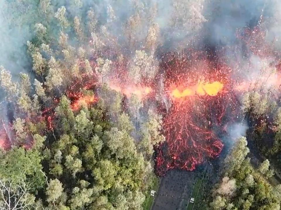 Hawaii volcano latest: Drone footage shows lava spewing out of ground near residential area after Mount Kilauea erupts