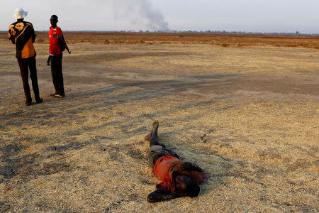 A man sleeps on the ground in Thonyor, Leer state, South Sudan, February 26, 2017. REUTERS/Siegfried Modola