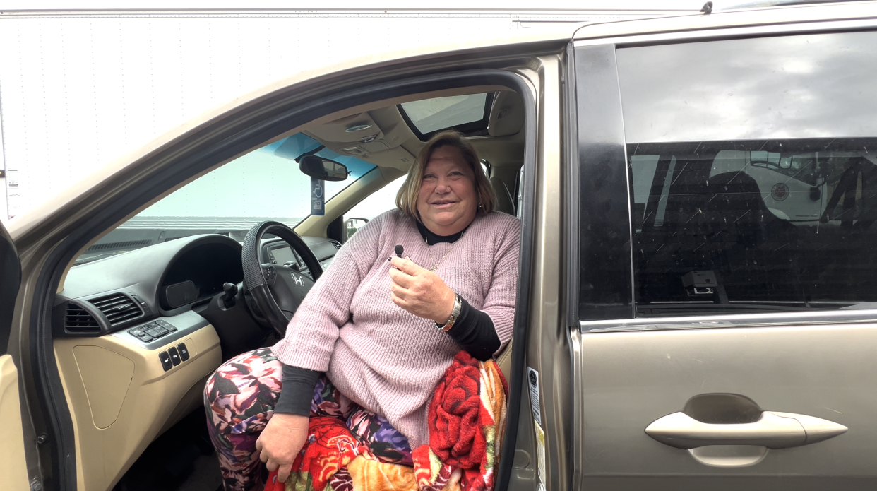 Jody Watts, a longtime recipient of the pantry, waits in line hours before the drive begins. / Credit: Simrin Singh/CBS News