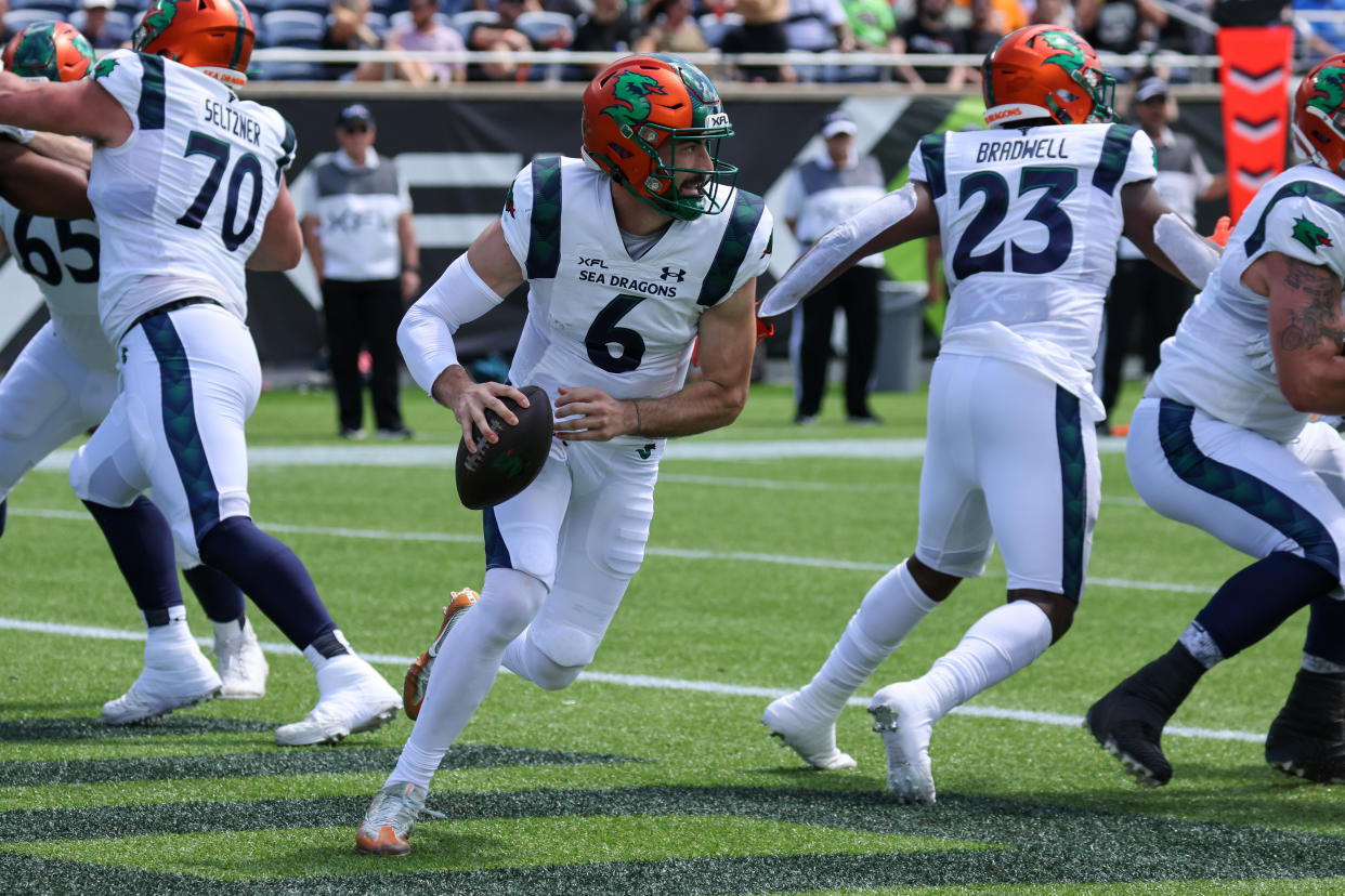 ORLANDO, FL - MARCH 25: Seattle Sea Dragons quarterback BEN DINUCCI (6) runs the ball during the XFL game between the Seattle Sea Dragons and the Orlando Guardians on March 25, 2023, at Camping World Stadium in Orlando FL.(Photo by Joe Petro/Icon Sportswire via Getty Images)