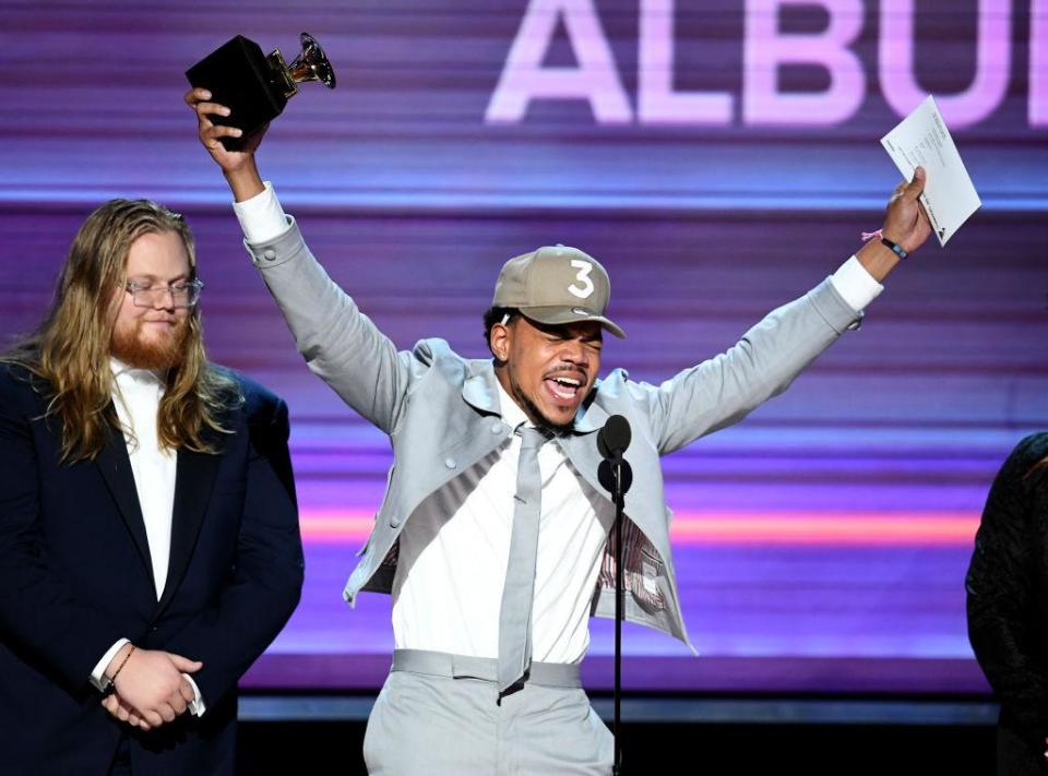 Chance the Rapper accepts his Grammy Award for Best Rap Album with manager Patrick Corcoran: Getty