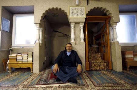 Jamal Habbachich, who heads a council of 22 Molenbeek mosques, poses for a picture at Attadamoun Mosque in the neighbourhood of Molenbeek, in Brussels, Belgium, November 20, 2015. REUTERS/Youssef Boudlal
