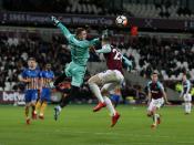 Reece Burke's extra-time winner spares West Ham blushes in FA Cup replay against Shrewsbury Town