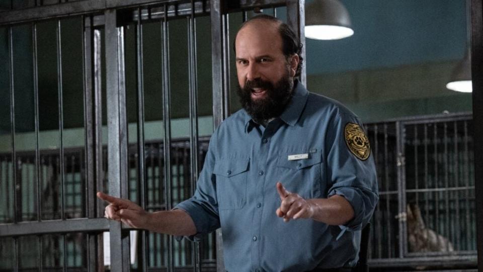 Willy (Brett Gelman), a bitter animal control officer, in “Strays” (Universal)