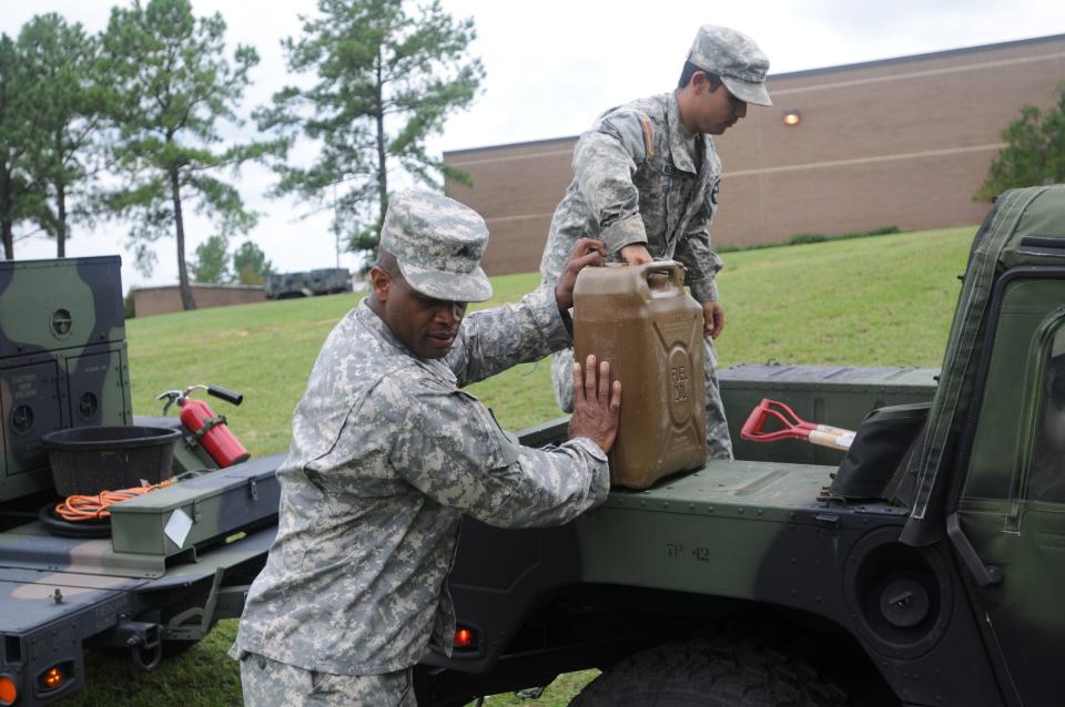 Soldiers collecting equipment after completing the Grecian Firebolt 2012 exercise in support of the 335th Signal Command.