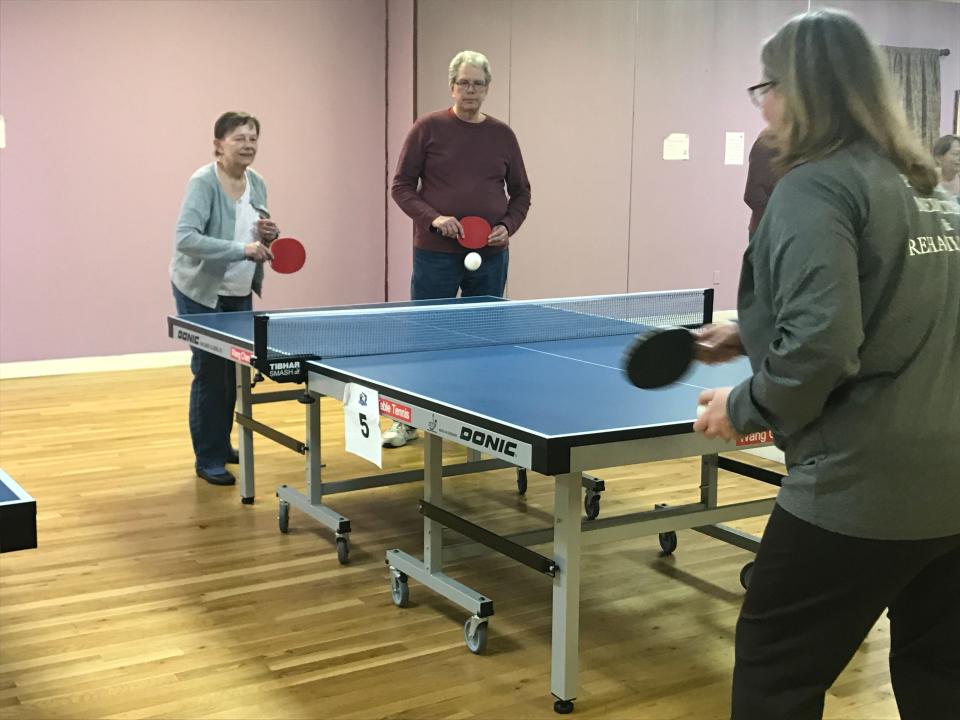 Linda Ferrari of Waldwick gets ready to receive a tennis ball during the first Ping Pong Parkinson meeting in Westwood on Feb. 6, 2020.