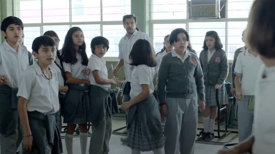 Eugenio Derbez (center, background) in a still from "Radical." - Pantelion Films