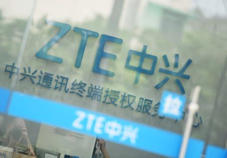 FILE PHOTO: A sign of ZTE Corp is pictured at its service centre in Hangzhou, Zhejiang province, China May 14, 2018. REUTERS/Stringer/File Photo