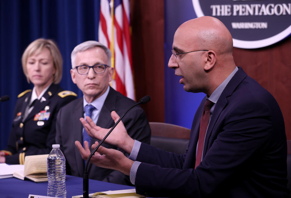 Dr. Kayvon Modjarrad (R), director of Emerging Infectious Diseases at the Walter Reed Army Institute of Research, joins members of a panel at the Pentagon in discussing efforts at investigating and developing vaccine candidates against COVID-19 March 05, 2020 in Arlington, Virginia. Also pictured are Dr. Nelson Michael M.D. (C), Director of the Center for Infectious Disease Research, and Col. Wendy Sammons-Jackson (L), Medical Service Corps. (Win McNamee/Getty Images)