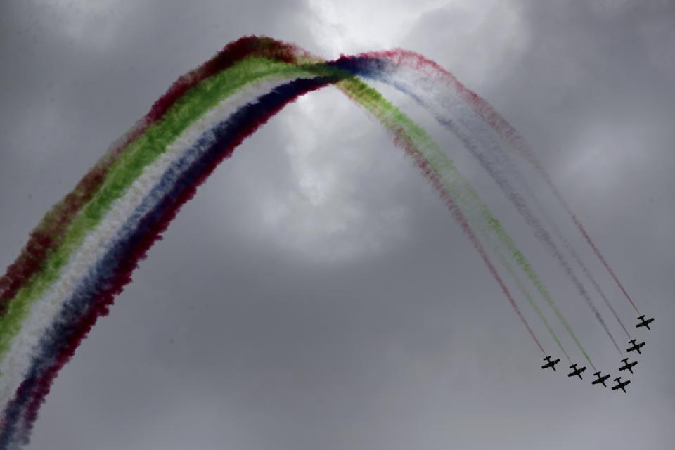 Al Fursan, or the Knights, a UAE Air Force aerobatic display team, perform during the opening day of the International Defence Exhibition & Conference, IDEX, in Abu Dhabi, United Arab Emirates, Sunday, Feb. 21, 2021. (AP Photo/Kamran Jebreili)