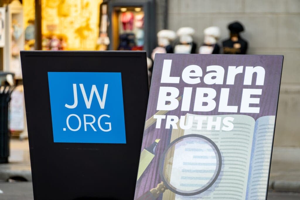 PALERMO, SICILY – FEBRUARY 2019: The stand of Jehovah Witnesses promoting their religion and revealing the bible truths