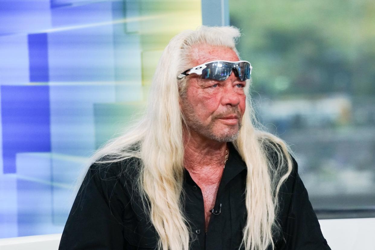 Duane Chapman looks amazing in his long blonde hair and stylish glasses.