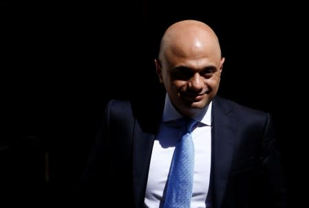 Newly appointed Britain's Chancellor of the Exchequer Sajid Javid is seen outside Downing Street in London