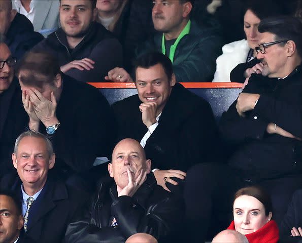 <p>Catherine Ivill/Getty</p> Harry Styles attends the Premier League match between Luton Town and Manchester United at Kenilworth Road on February 18, 2024