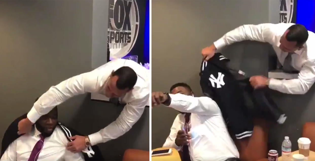 Alex Rodriguez sneaks up behind David Ortiz and tries to put a Yankees jacket on him. (@AROD)