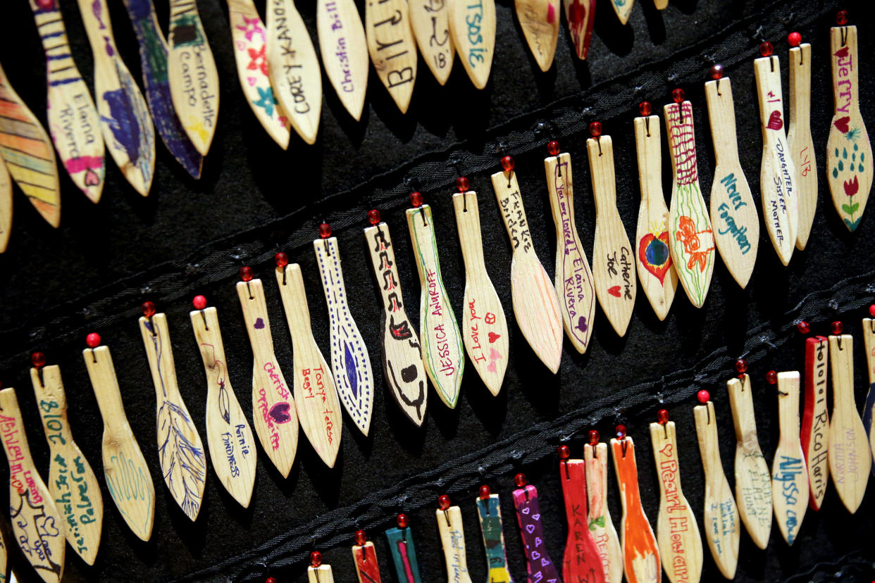 Image: Small, wooden paddles with the names of missing and murdered indigenous women on a garment at a memorial vigil at the University of Washington in Seattle on Feb. 14, 2019. (Genna Martin / via Getty Images, file)