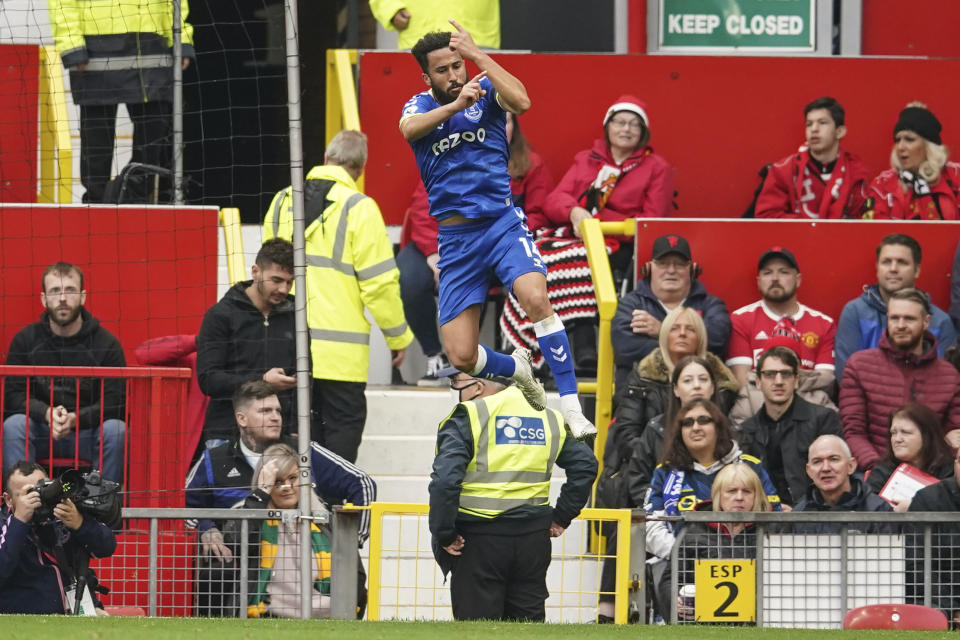 Everton's Andros Townsend celebrates after scoring his side's opening goal during the English Premier League soccer match between Manchester United and Everton, at Old Trafford, Manchester, England, Saturday, Oct. 2, 2021. (AP Photo/Dave Thompson)