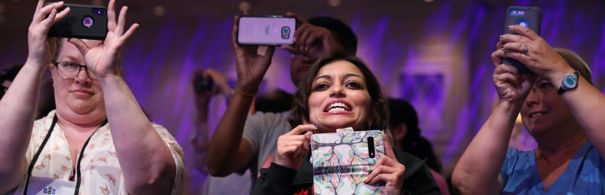 <span class="caption">Behind every spelling bee champ is at least one very engaged parent.</span> <span class="attribution"><a class="link " href="https://www.gettyimages.com/detail/news-photo/parents-take-photographs-of-their-children-during-the-news-photo/1152283531" rel="nofollow noopener" target="_blank" data-ylk="slk:Chip Somodevilla/Getty Images;elm:context_link;itc:0;sec:content-canvas">Chip Somodevilla/Getty Images</a></span>