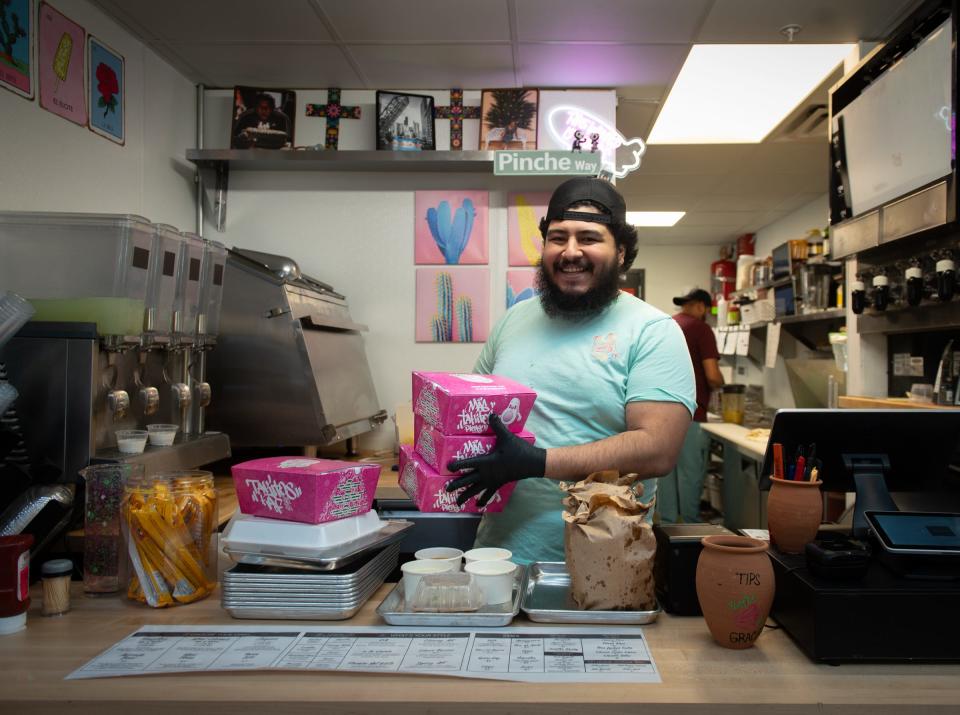 Juan Vera, owner of Takitos AF poses for a portrait, Tuesday, Jan. 23, 2024, at his new Mexican restaurant inside Lansing Shuffle.