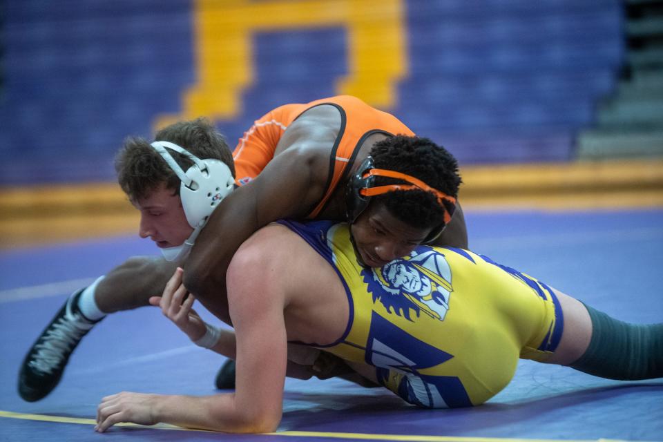 Freeport's Markel Baker, shown here taking down a Hononegah wrestler on Tuesday, June 8, 2021, in Roscoe, has the Pretzels poised to defend its NIC-10 title on Saturday, Jan. 29, 2022, at Rockford Guilford High School.