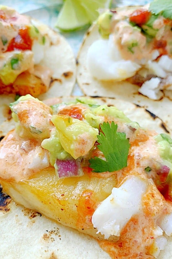 Fish tacos with toppings.