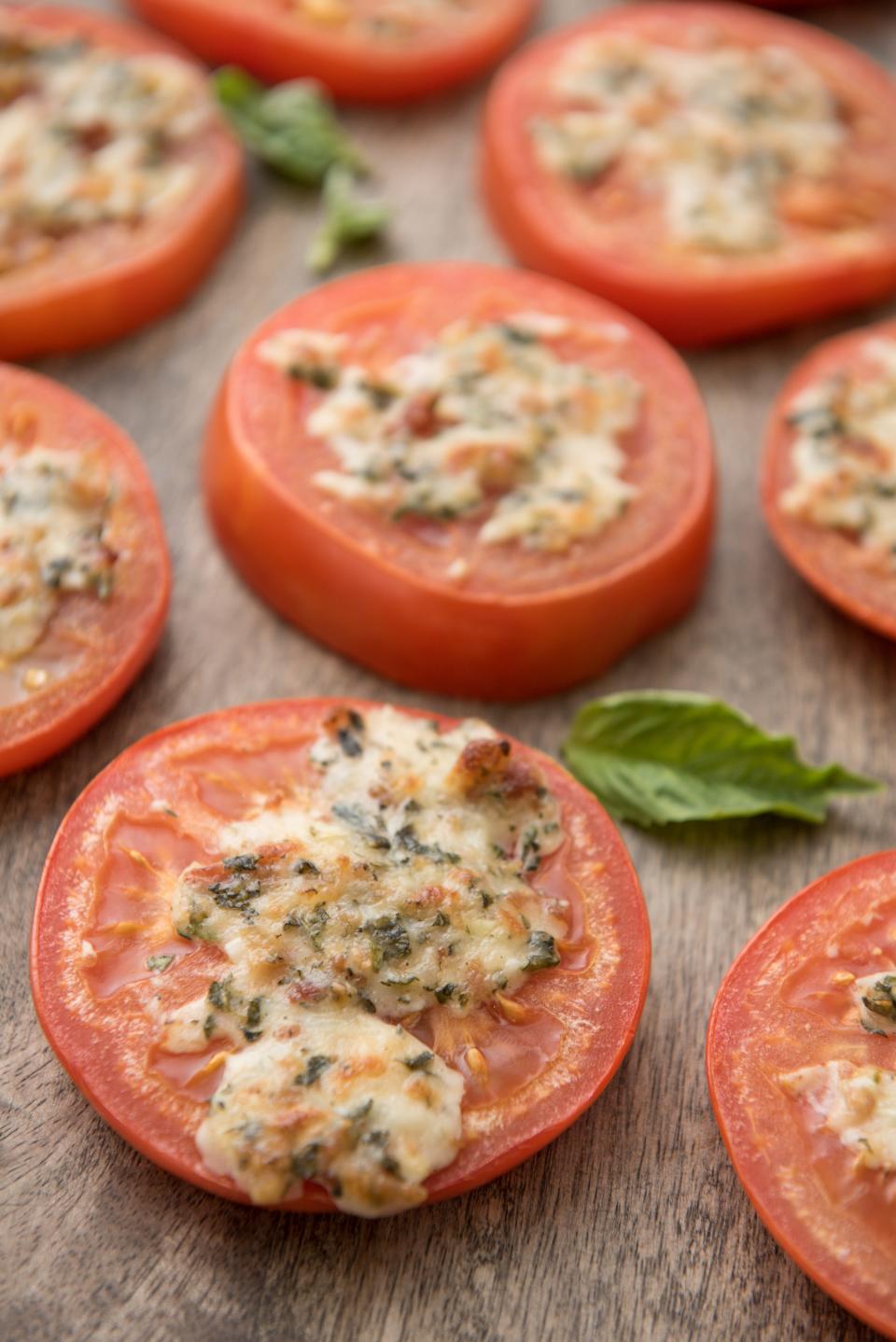 Broiled tomatoes with mozzarella and Parmesan.
