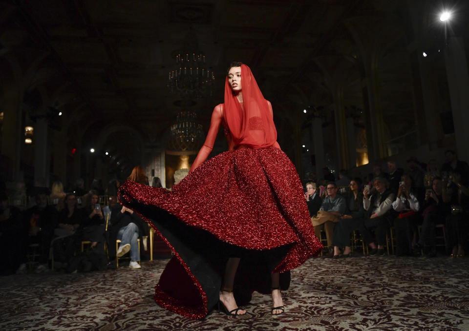 A model walks the runway during the Christian Siriano Fall/Winter 2024 fashion show at The Plaza Hotel during New York Fashion Week on Thursday, Feb. 8, 2024, in New York. (Photo by Evan Agostini/Invision/AP)