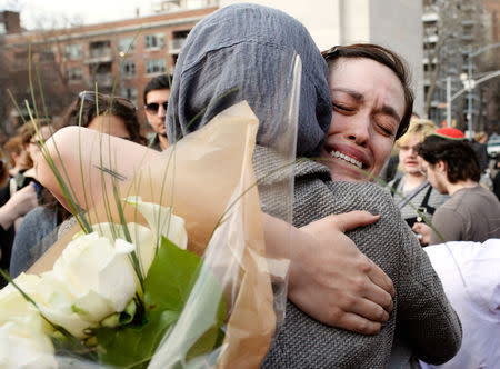 People gather at a vigil to mourn for the victims of the Christchurch mosque attack in New Zealand, at Washington Square Park in Manhattan, in New York City, New York, U.S. March 15, 2019. REUTERS/Rashid Umar Abbasi