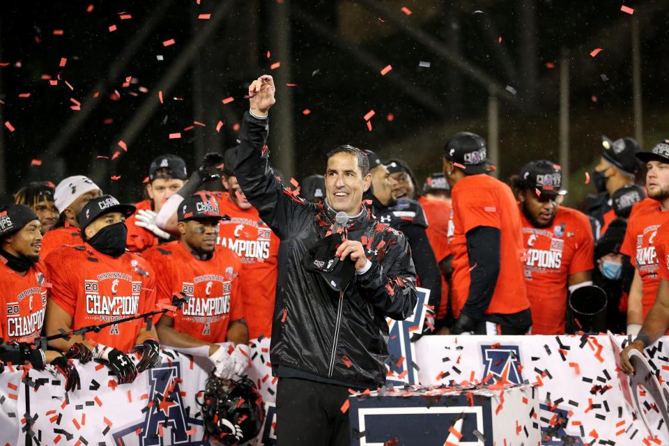 Cincinnati Bearcats head coach Luke Fickell smiles during the championship trophy presentation following the American Athletic Conference championship football game against the Tulsa Golden Hurricane, Saturday, Dec. 19, 2020, at Nippert Stadium in Cincinnati. The Cincinnati Bearcats won, 27-24. 