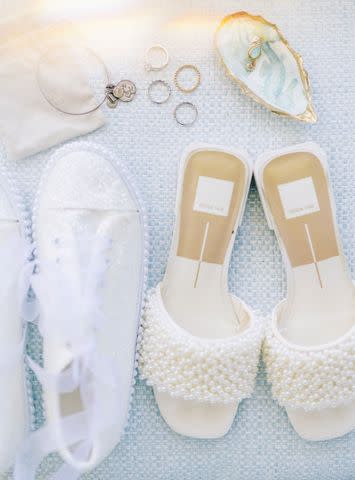 <p>Alex Gordias</p> A look at the bride's shoes and jewelry for her wedding day.