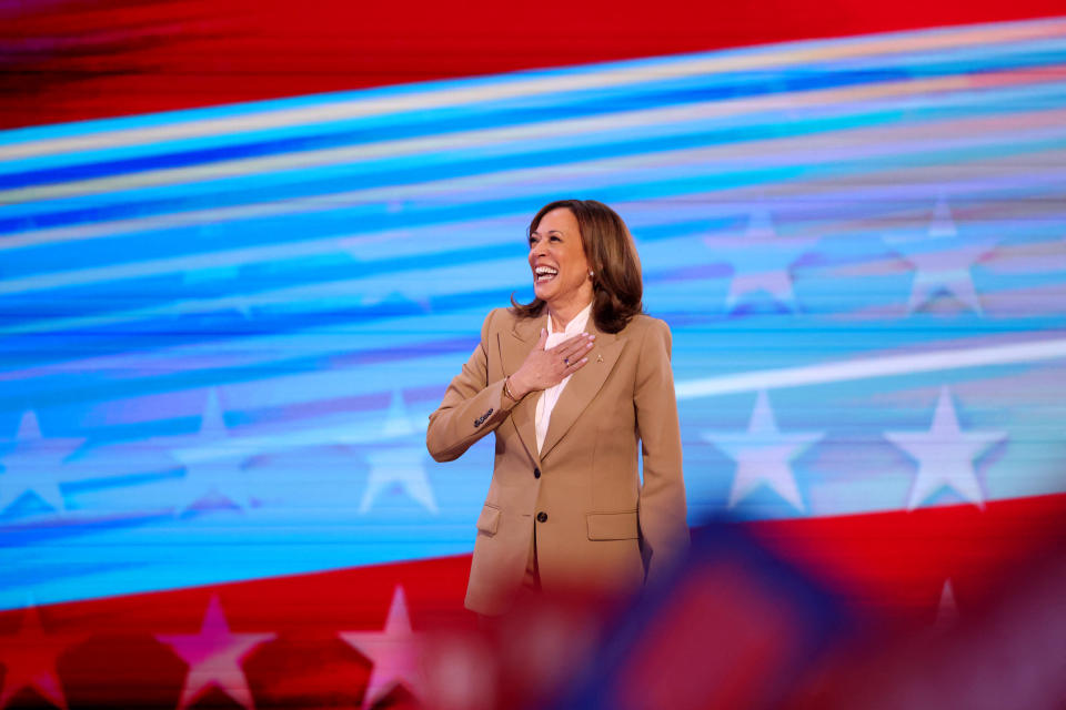 TOPSHOT - US Vice President and 2024 Democratic presidential candidate Kamala Harris gestures as she speaks on the first day of the Democratic National Convention (DNC) at the United Center in Chicago, Illinois, on August 19, 2024. Vice President Kamala Harris will formally accept the party's nomination for president at the DNC which runs from August 19-22 in Chicago. (Photo by CHARLY TRIBALLEAU / AFP) (Photo by CHARLY TRIBALLEAU/AFP via Getty Images)