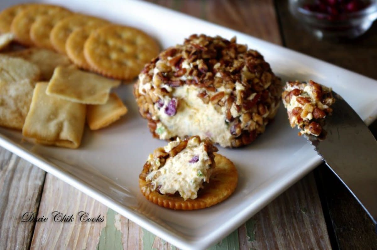 <p>Shea Goldstein</p><p>Cheesy goodness with a kick and a hint of sweetness too.</p><p><strong>Get the recipe: <a href="https://parade.com/841584/sheagoldstein/pomegranate-jeweled-jalapeno-cheese-ball/" rel="nofollow noopener" target="_blank" data-ylk="slk:Pomegranate Jeweled Jalapeño Cheese Ball;elm:context_link;itc:0;sec:content-canvas" class="link rapid-noclick-resp">Pomegranate Jeweled Jalapeño Cheese Ball</a></strong></p>
