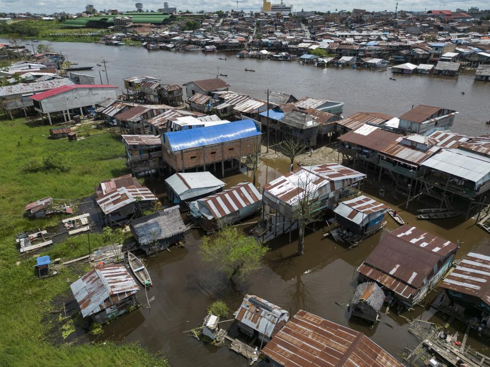 An aerial view of the Belen neighborhood of Iquitos, Peru, Saturday, May 25, 2024. The Indigenous community in the heart of Peru's Amazon known as the "Venice of the Jungle" is hosting the Muyuna Floating Film Festival. (AP Photo/Rodrigo Abd)