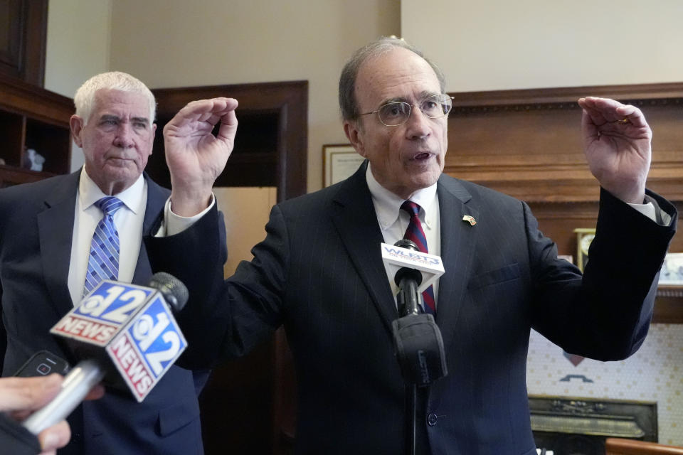 Mississippi Republican Lt. Gov. Delbert Hosemann, right, speaks to reporters about the Senate passing a Medicaid expansion bill at the state Capitol in Jackson, Miss., Thursday, March 28, 2024. (AP Photo/Rogelio V. Solis)