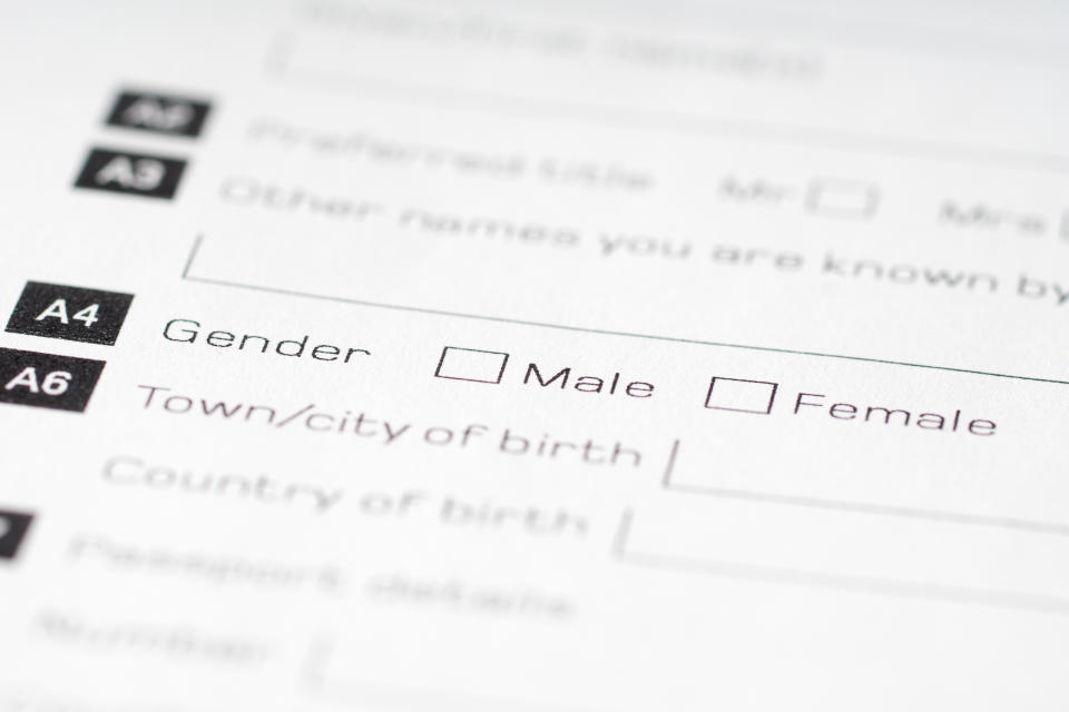 Photo shows a blank questionnaire with gender choice check boxes.