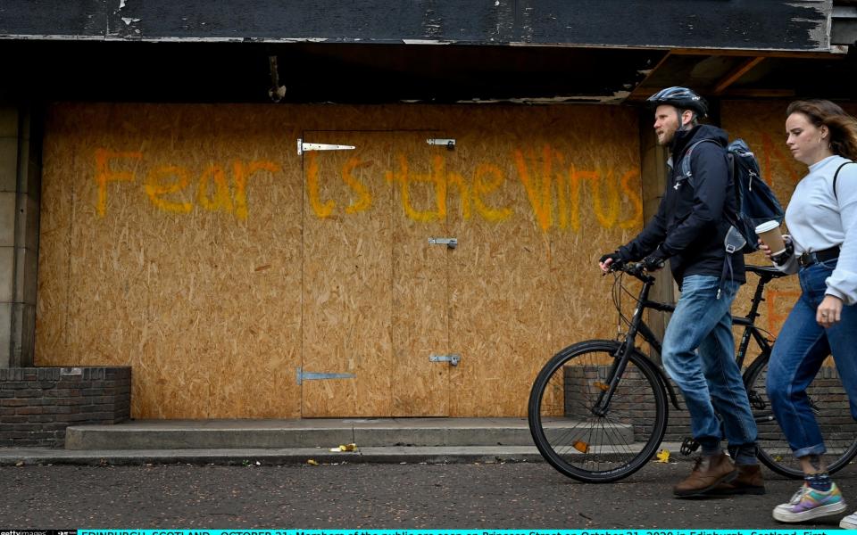 Members of the public are seen on Princess Street on October 21 - Jeff J Mitchell/Getty