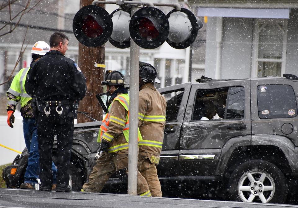 Palmyra Borough Police and local authorities are investigating after a 63-year-old woman died Tuesday morning when her Jeep was struck by a train at a railroad crossing.