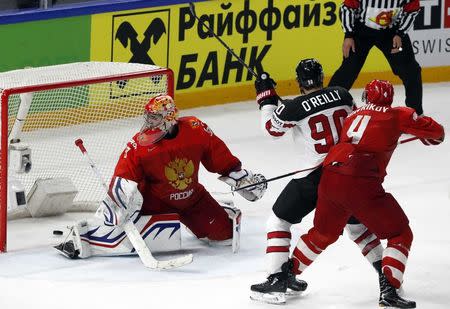 Ice Hockey - 2018 IIHF World Championships - Quarterfinals - Russia v Canada - Royal Arena - Copenhagen, Denmark - May 17, 2018 - Ryan O’Reilly of Canada scores a goal. REUTERS/Grigory Dukor