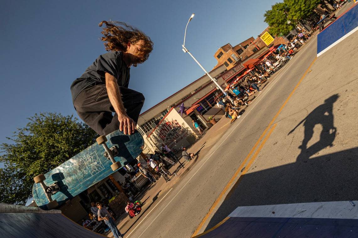 Adam Moen performs a skate trick on a ramp in the skate jam area of Open Streets on Magnolia Avenue in Fort Worth on Saturday. Chris Torres/ctorres@star-telegram.com