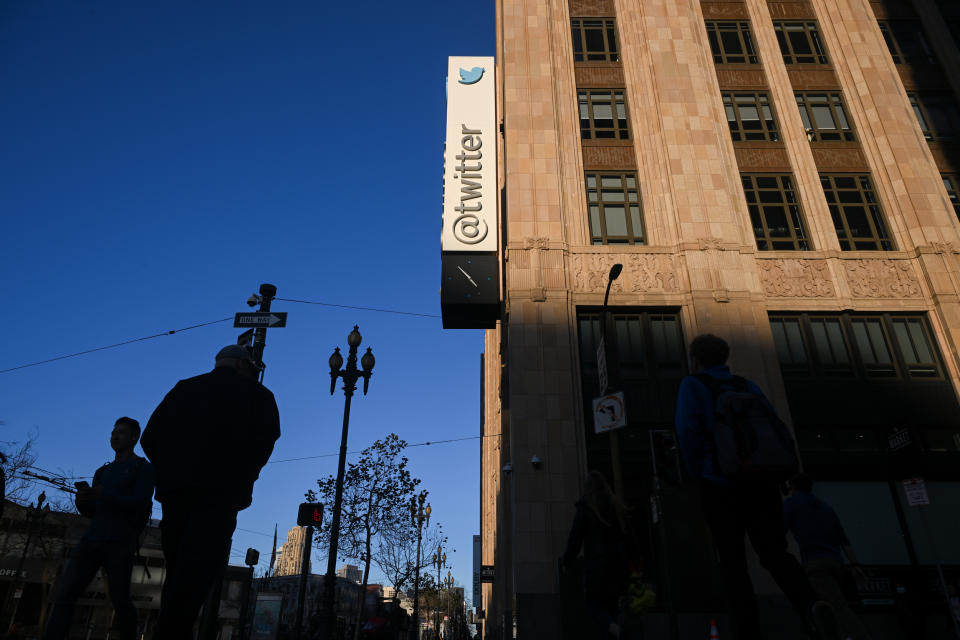 People walk by the Twitter Headquarters in San Francisco (Tayfun Coskun / Anadolu Agency via Getty Images file)