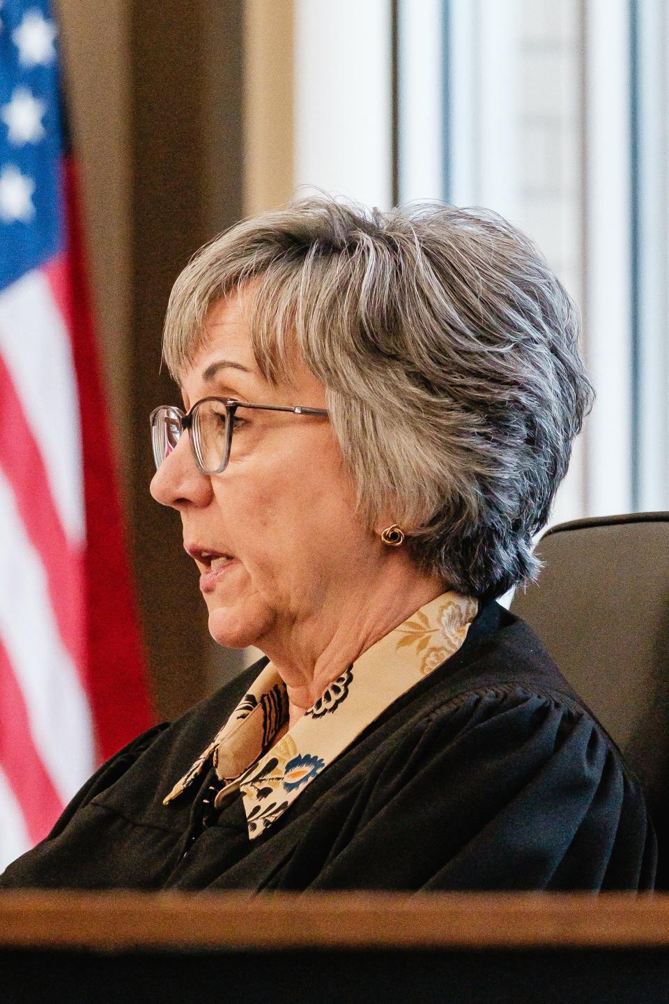 Judge Nanette DeGarmo VonAllman addresses Jeremiah Johnson during a hearing on his failure to remit business taxes, Monday, April 29 in New Philadelphia Municipal Court.