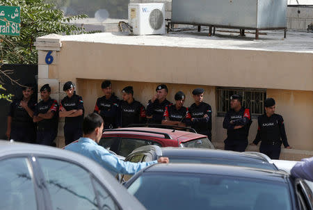 Jordanian police stand guard in front of a hospital where the body of Jordanian writer Nahed Hattar, who was shot dead, was held in Amman, Jordan, September 25, 2016. REUTERS/Muhammad Hamed