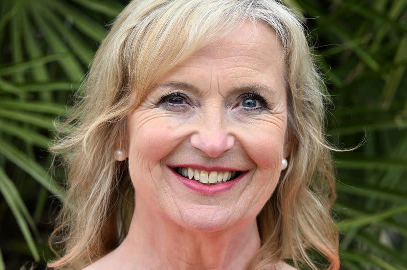 Carol Kirkwood poses for a picture