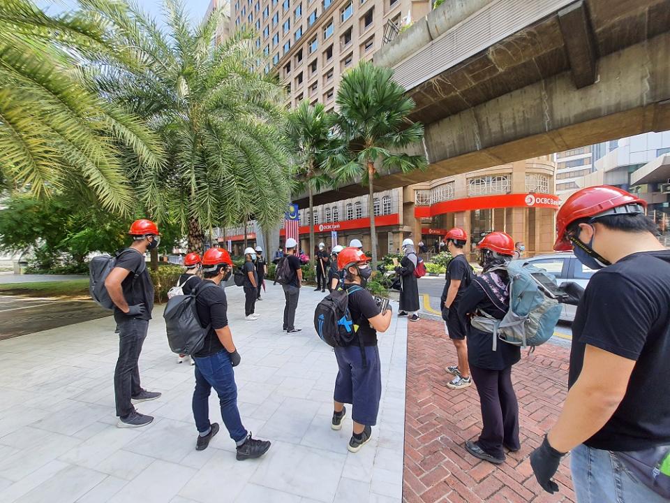 A crowd gathered at the Masjid Jamek LRT Station ahead of the #Lawan protest today, July 31, 2021. ― Picture by Shafwan Zaidon