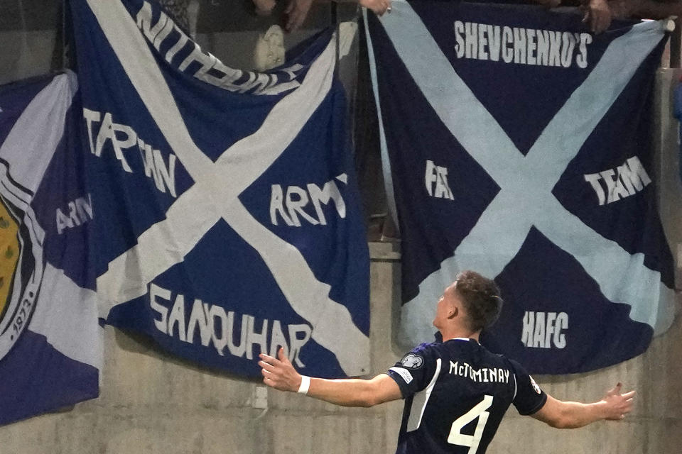 Scotland's Scott McTominay celebrates after scoring against Cyprus during the Euro 2024 group A qualifying soccer match between Cyprus and Scotland at AEK arena stadium in Larnaca, Cyprus, Friday, Sept. 8, 2023. (AP Photo/Petros Karadjias)